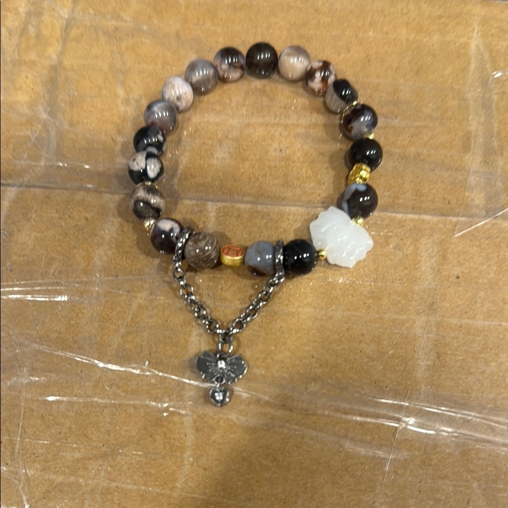 Elegant Beaded Bracelet with Silver Charm